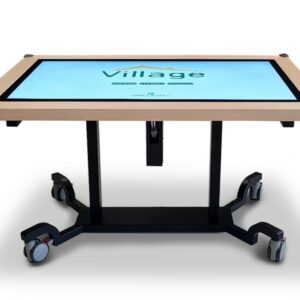 Table tactile multitouch mobile du Village de Verdurable, dotée de roulettes pour une utilisation flexible en milieu thérapeutique.